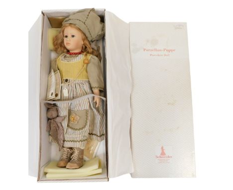 A Schneider hand made doll Lucy, limited edition 214/750, boxed.