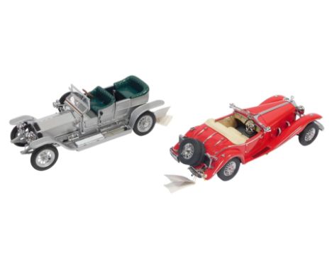 The Franklin Mint diecast Rolls Royce Silver Ghost, and a Franklin Mint diecast Mercedes 500K special roadster, boxed. (2)