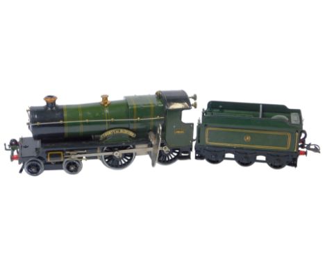 A Hornby tinplate clockwork O gauge locomotive County of Bedford, 4-4-0, 3821 in GWR lined green.