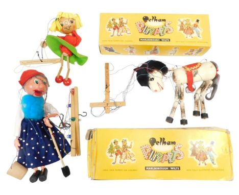 A boxed Pelham Puppet SM Old Lady, a boxed Pelham Puppets horse, and another puppet. (3)