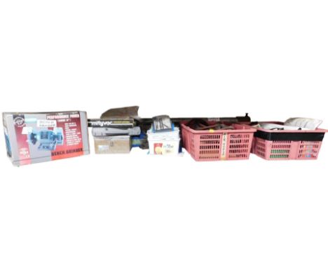 A bench grinder, compression tester, cooling system tester, engine lift, brake pressure equaliser, oxy-acetylene tools, gauge