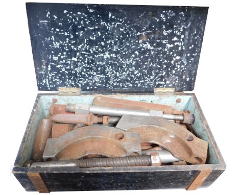 A pipe bender in wooden case. 
