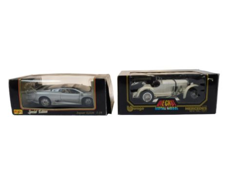 A Maisto diecast Jaguar XJ220, 1:18 scale, and a Burago diecast Mercedes-Benz SKL 1931, 1:18 scale, both boxed. (2)