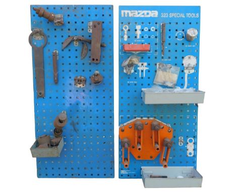 Two Mazda Special Tools boards, for 323, and another.