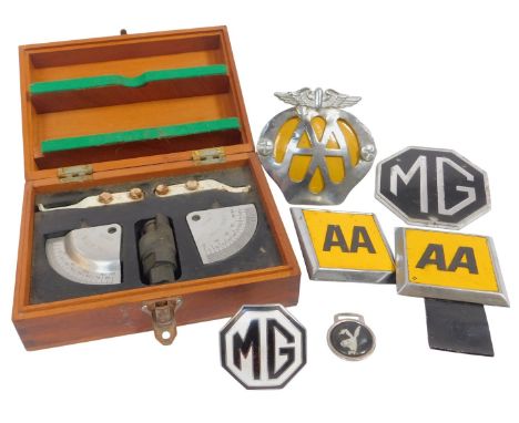 A group of AA and MG road badges, together with a Starboard one port engine throttle synchronising kit, in a wooden case. 