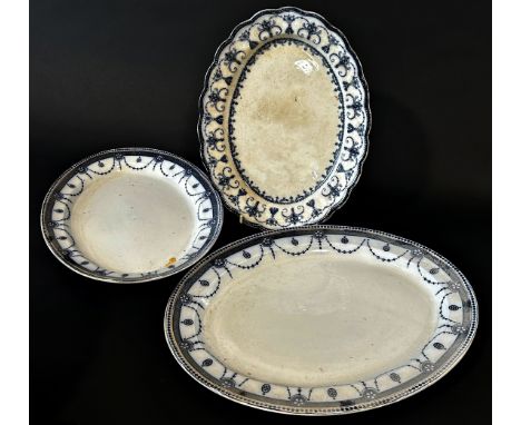 A large Rhine pattern meat plate with gravy well and drainer, and five other blue and white meat plates
