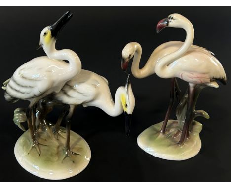 A collection of bird related ornaments including Herons and Flamingos, Goebel Golden Oriel, fighting cocks, etc (7)