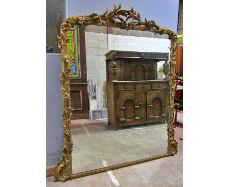 A large 19th century gilt framed wall mirror with moulded detail in the Chippendale style, 175 x 130cm.