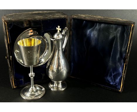 A late Victorian army chaplin silver travelling communion set of ewer, chalice and paten, London 1889, maker Jane Brownett, 4