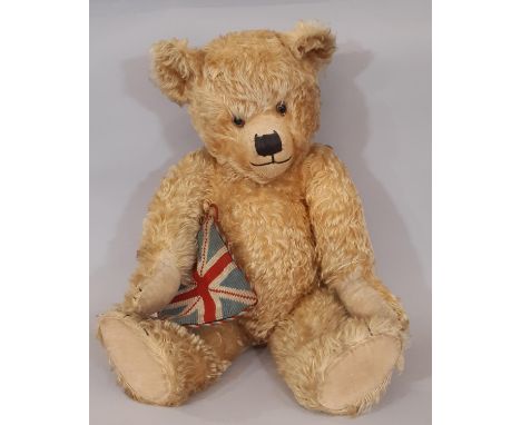 Large vintage teddy bear with golden plush, jointed body, long tapering limbs, velvet paw pads, and nose, mouth  and claws, p