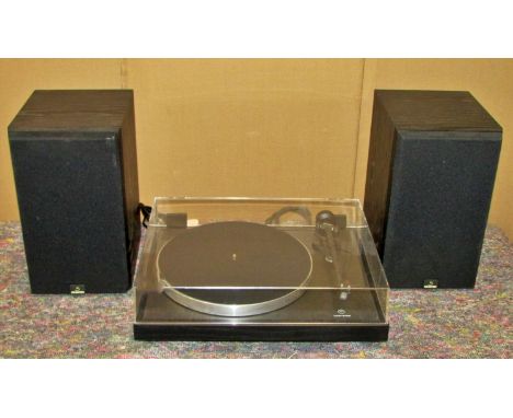 A vintage stereo equipment to include a Linn Basik turntable, Rotel stereo tuner RT-930AX, stereo integrated amplifier RA-930