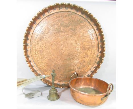 A large brass  Mughal Indian copper engraved charger 69cm diameter , together with a copper preserve pan, a brass hand bell a