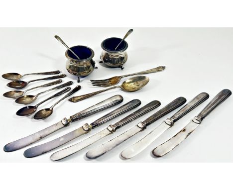 A cased silver condiment set, a cased set of six teaspoons, a christening spoon and fork, six silver handled pastry knives, 4