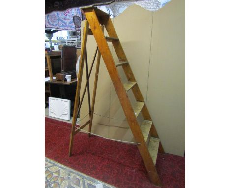 A vintage pine and ply folding step ladder, 191cm high.