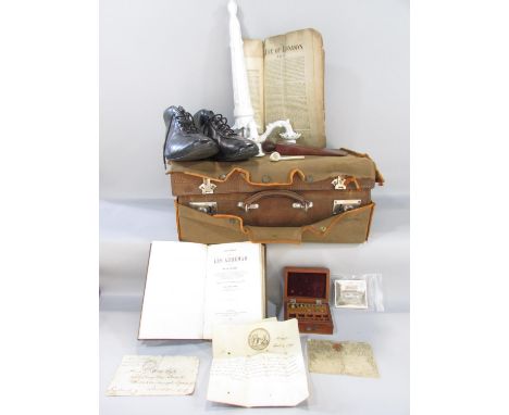 A vintage faux crocodile suitcase including a pair of men’s Cordani black leather shoes s, an old small clay pipe, ephemera, 