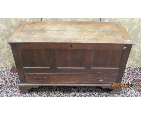 An 18th century oak mule chest with rising lid over a single frieze drawer and bracket supports, 120cm long,
