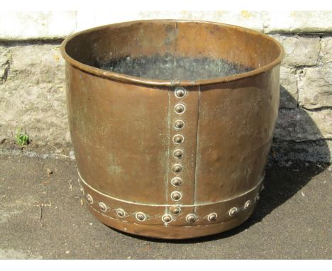 A large antique riveted copper hopper / cauldron, 42cm high, 54cm diameter.