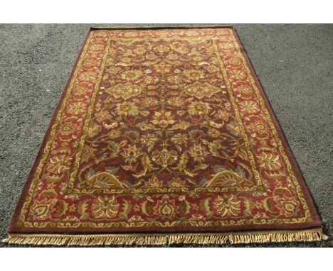 An Indian Jaipur carpet with an all over floral pattern, 252cm x 160cm