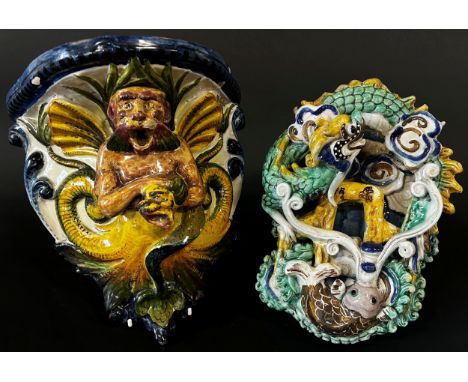 Chinese Sancai type glazed stoneware wall pocket, decorated with a dragon amongst clouds below carp, 25cm x 17cm, together wi