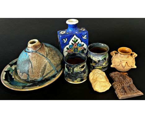 A collection of items to include a Persian blue ground flask, Mdina glass vase, further glassware, studio pottery etc