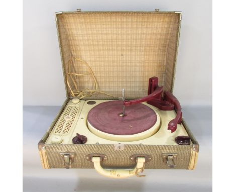 A Collaro Regentone portable three speed record player with stacking arm, circa 1950’s.