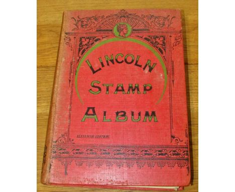 A small Lincoln stamp album featuring late 19th and early 20th century stamps from Great Britain and around the world togethe