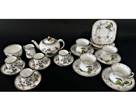 A collection of Paragon Bird of Paradise pattern coffee wares comprising coffee pot, two sugar bowls, milk jug, cream jug, tw