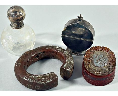 An ecclesiastical silver metal wafer dispenser, a heavy bronze bangle and intricately carved amber Bakelite trinket box, sign