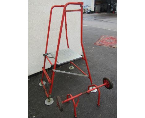 A Henchman folding and adjustable arborists ladder with tubular steel frame 