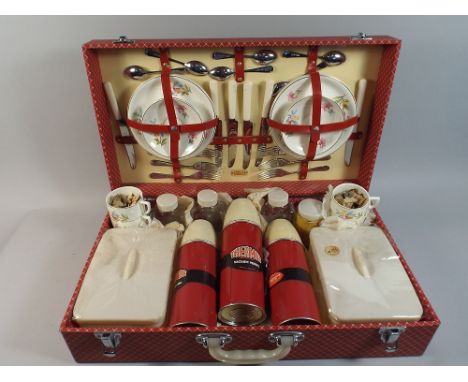 A Cased Picnic Set by Sirram, Fully Fitted