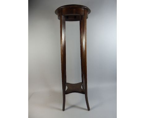 An Edwardian Circular Topped Oak Jardiniere Stand with Stretcher Shelf. 91cm High