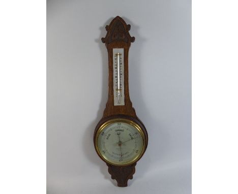 A Late Victorian Oak Wheel Barometer with Aneroid Movement by Felix Martin, Swansea