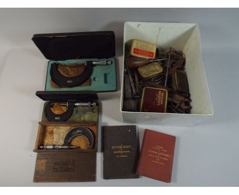 A Collection of Engineers Tools, Micrometers and Booklets. 