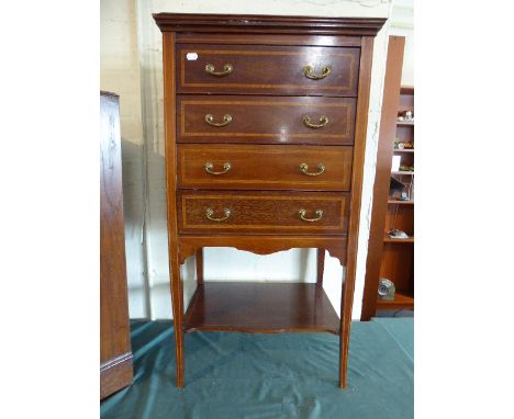 An Edwardian String Inlaid Mahogany Four Drawer Music Cabinet with Stretcher Shelf on Tapering Square Legs, 53cm Wide, 97cm H