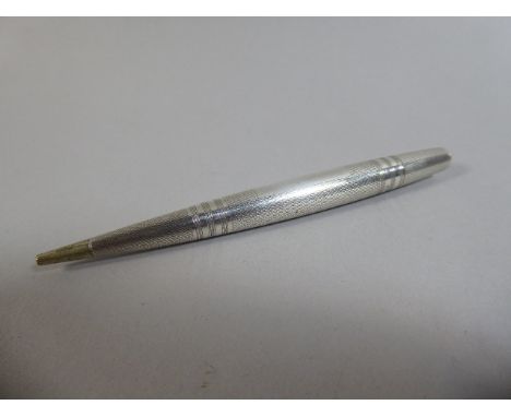 A Silver Engine Turned Propelling Pencil. 17.3gms