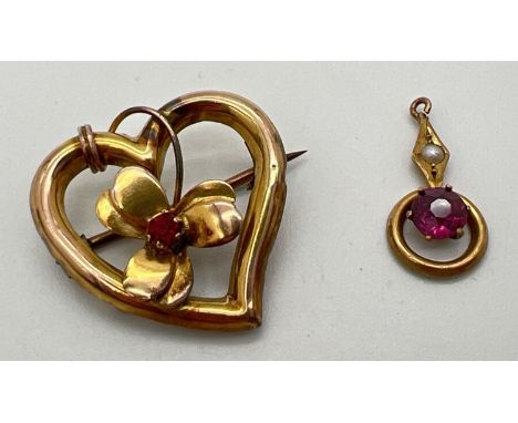 2 items of vintage gold jewellery. An Art Deco 9ct gold pendant set with a round cut ruby and a single seed pearl (bale cut t