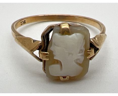 A 9ct gold square shaped cameo ring with shaped shoulders. Gold marks to inside of band. Size MÂ½, total weight approx. 1.5g.