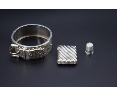 A Victorian silver vesta case, by&nbsp;Joseph Whitten, Birmingham 1890, 4cm; together with a Victorian silver hinged buckle b