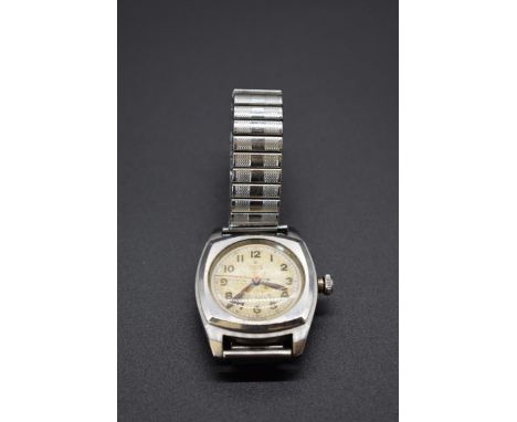 A circa 1945 Rolex Oyster cushion shape stainless steel manual wind wristwatch, ref 4647, case No.275874, 31mm, on later expa