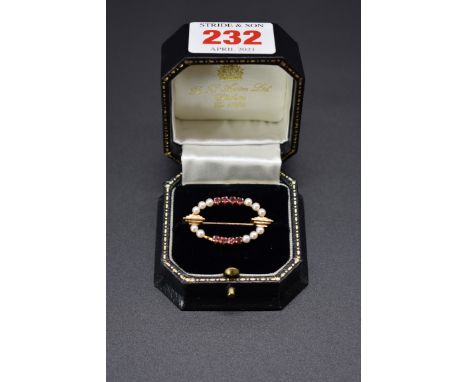A 9ct gold ruby and cultured pearl brooch, 3.3cm, 4g gross weight. 