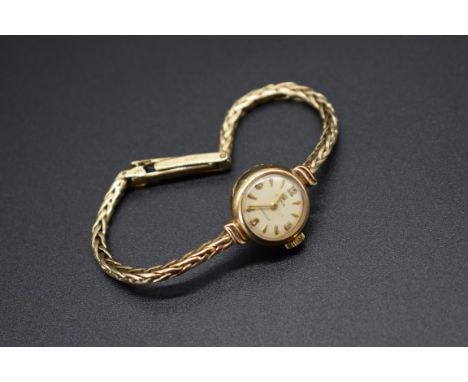 A vintage Cyma Cymaflex 9ct gold manual wind 15mm ladies wristwatch, 11.4g. 