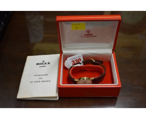 A 1960s Tudor Royal 9ct gold manual wind wristwatch,&nbsp;ref 7011, hallmark Birmingham 1964, 30mm, on leather strap, with bo