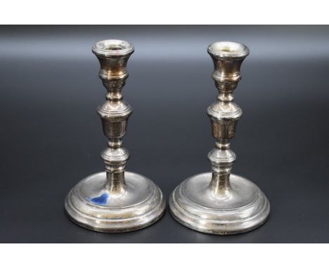 A pair of silver candlesticks, by&nbsp;Harrison Brothers &amp; Howson Ltd,&nbsp;Birmingham 1988, 16cm, filled. 