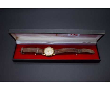 A vintage Smiths mid-sized manual wind wristwatch, on leather strap. 