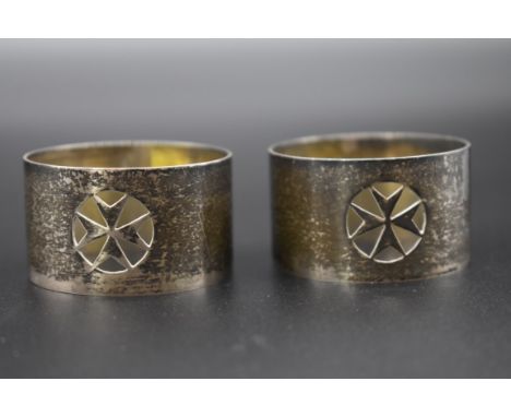 A pair of Maltese .917 napkin rings, by C R, 4.4cm diameter. 
