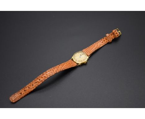 A circa 1923 Longines yellow metal manual wind ladies wristwatch,&nbsp;stamped 18k, Serial number 4093774, 21mm, on a replace