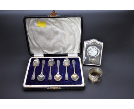 A cased set of six silver teaspoons, by H V Pithey &amp; Co, Sheffield 1917; together with a modern silver easel back timepie