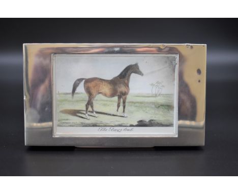 A continental sterling silver cigarette box, the lid having inset print of 'The Bay Arab' and engraved to inscription to fron
