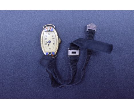 A vintage yellow metal and coloured enamel manual wind 15mm ladies wristwatch stamped 18k, on ribbon strap. 