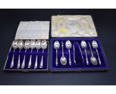 A cased set of six silver apostle spoons and sugar tongs, by W Hutton &amp; Sons Ltd, London 1906-8, 113g. 